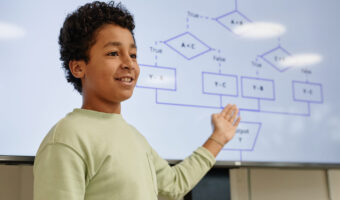 Boy Presenting in Coding Class