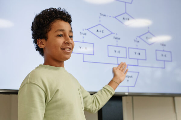 Boy Presenting in Coding Class